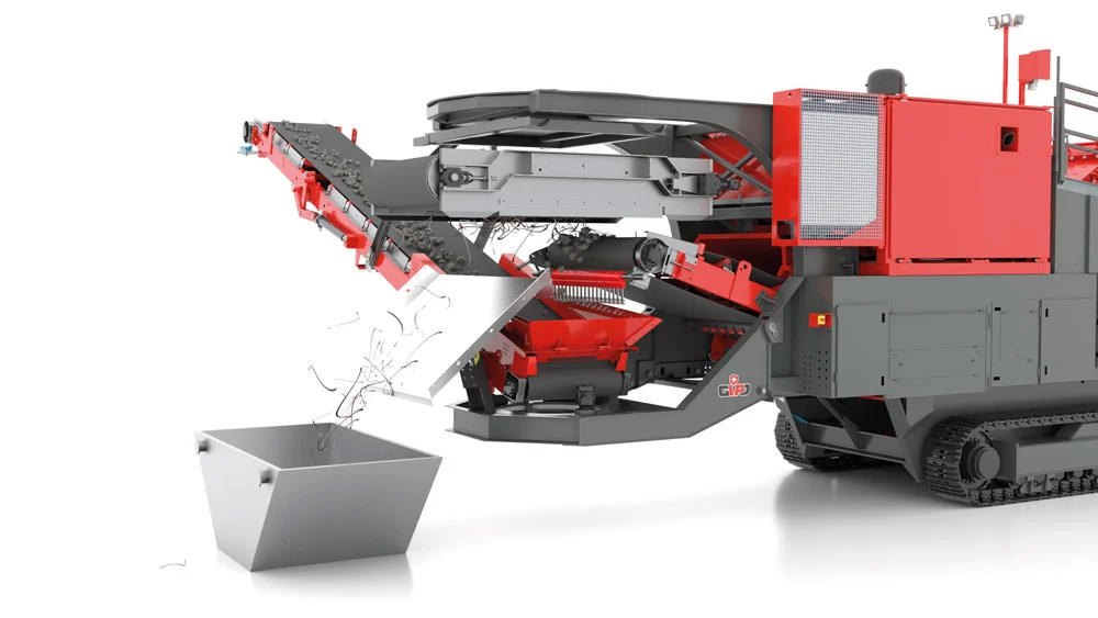 Mobile crushing plant rear view, discharge system and conveyors in operation.